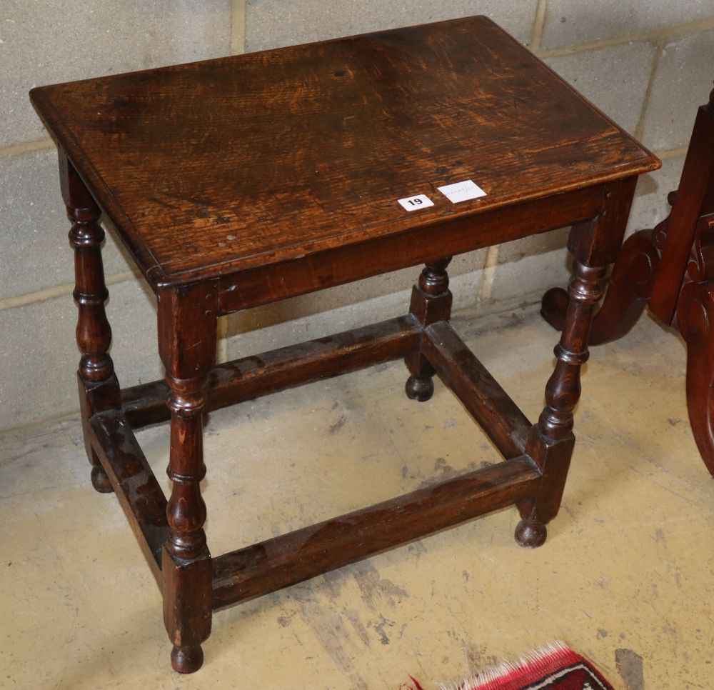 An early 18th century and later oak rectangular topped table, with baluster supports and all round stretchers, W.58cm, D.38cm, H.60cm